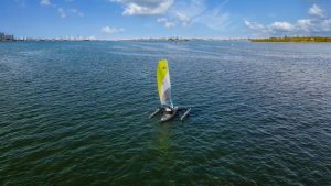 Father and daughter set sail in kayak on Biscayne Bay with IMM Quality Boat Lifts