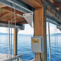 boathouse lift side mount brackets in use allow installation of standard top beams