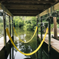 These yellow boathouse sling bunks are part of a custom bunk system and cradle set