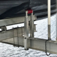 Closeup of custom cable rollers in use as IMM Quality Boat Lift accessories