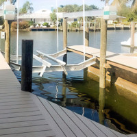 Double kick cradle beam boat lift parts in use