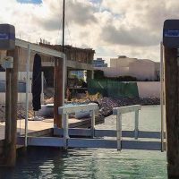 Pontoon risers for boat lift bunk systems and cradles