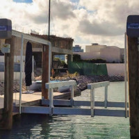 Pontoon risers for boat lift bunk systems and cradles